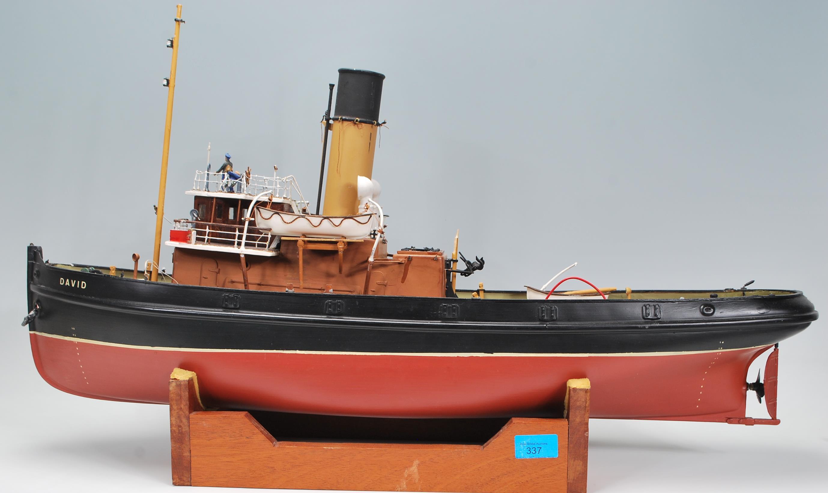A wooden and composite model boat - tub boat with name ' Davie ' complete with an inset motor (