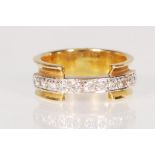 A CONTEMPORARY 18CT GOLD & DIAMOND HALF ETERNITY R