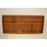 A 1970's retro 20th century beech and elm wood Ercol plate rack having shelved centre with panel