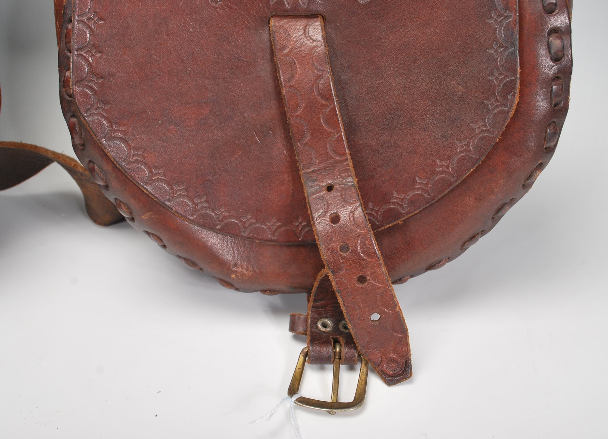 A pair of vintage 20th Century brown leather stitched saddle bags with rounded compartments having - Image 3 of 5
