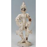 A Tibetan carved wooden Wenshu manjushri Buddha figurine modelled standing, raised on a plinth base,