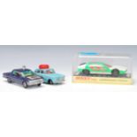 Three vintage 20th Century diecast model toy cars to include a Corgi Oldsmobile super 88 Man From
