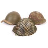 COLLECTION OF WWII BRITISH ARMY TURTLE STEEL COMBA