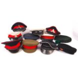 COLLECTION OF ASSORTED MILITARY PEAKED CAPS / BERE