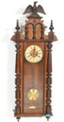 A 19th Century Victorian walnut cased Vienna regul