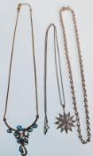 A group of three silver necklaces to include a tri