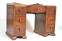 A 1930's Art Deco walnut twin pedestal office desk