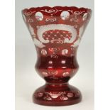 A 20th Century ruby glass vase of tapering knopped