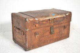 A 19th Century brown leather carriage travel trunk