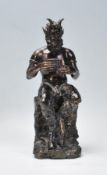 A cast faux bronze classical figurine sculptural o