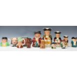 A collection of thirteen 20th Century Toby jugs of