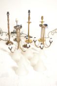 A group of contemporary antique style brass light