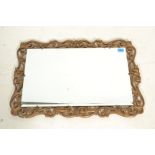 A vintage 20th Century decorative gilt framed mirr