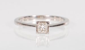 A stamped 950 platinum solitaire ring set with a s