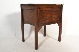 An early 20th Century oak fall front work box rais