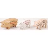 COLLECTION OF THREE ANTIQUE STYLE BUTCHERS PIG MON