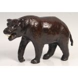 EARLY 20TH CENTURY ANTIQUE LEATHER CLAD MODEL OF A GROWLING BEAR