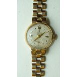 Tudor Royal, a ladies 9ct gold wrist watch, the circular dial with '12', dart and dot markers and