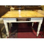 A painted pine kitchen table on turned legs, 121 x 81cm, drawer lacking and a painted pine wash