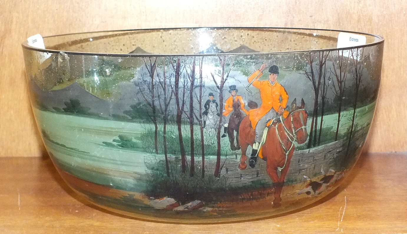 A 20th century glass bowl painted with a hunting scene, 24cm diameter.