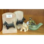 A pair of Art Deco alabaster and black painted spelter Scottie dog-mounted book ends, 12cm high, 9.