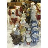 Various liver and white spaniel chimney ornaments and other ceramics and miscellaneous items.