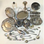 A heavily-embossed silver mirror and brush set, Birmingham 1915, other small silver, including