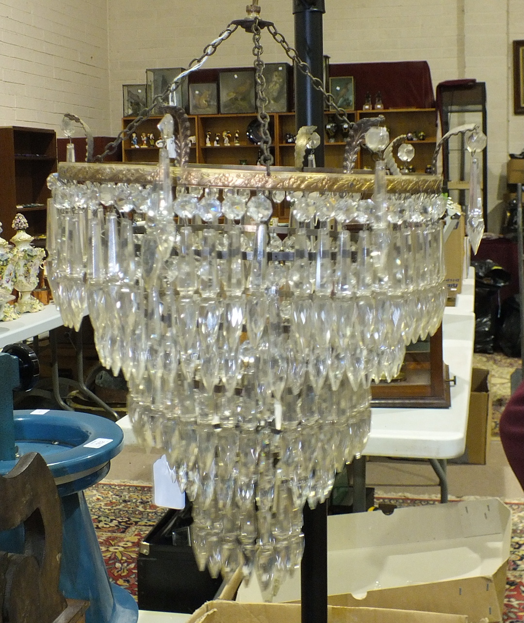A circular metal five-tier lustre-drop hanging light fitting, 46cm high, 31cm diameter and a smaller