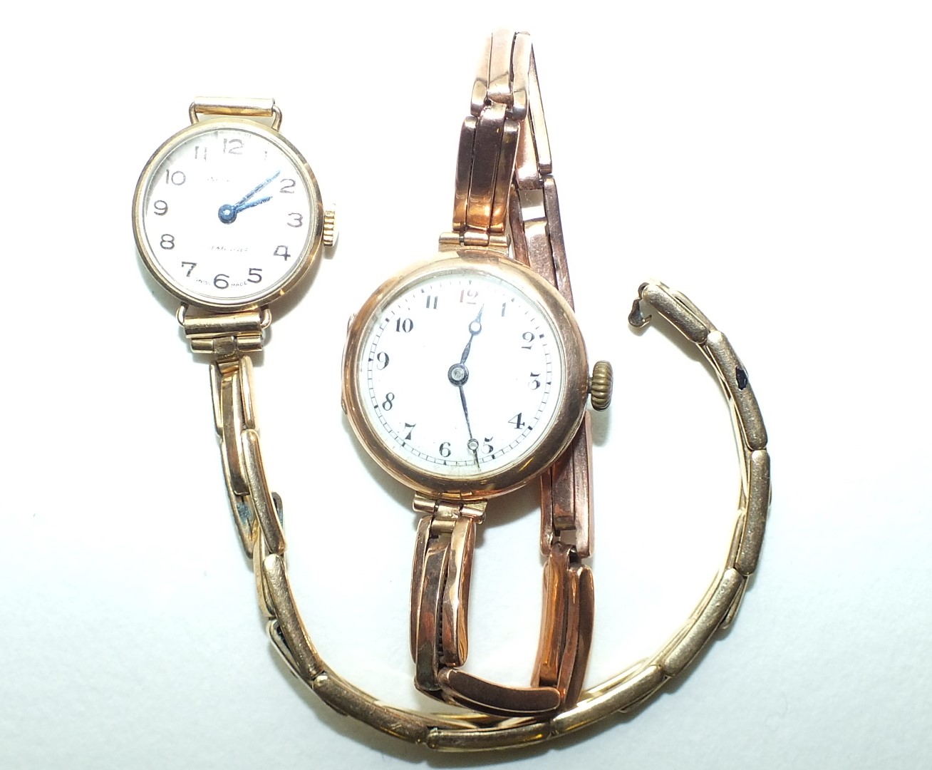 Two ladies wrist watches with 9ct gold cases and sprung bracelets, (both a/f), 31.9g, (2).