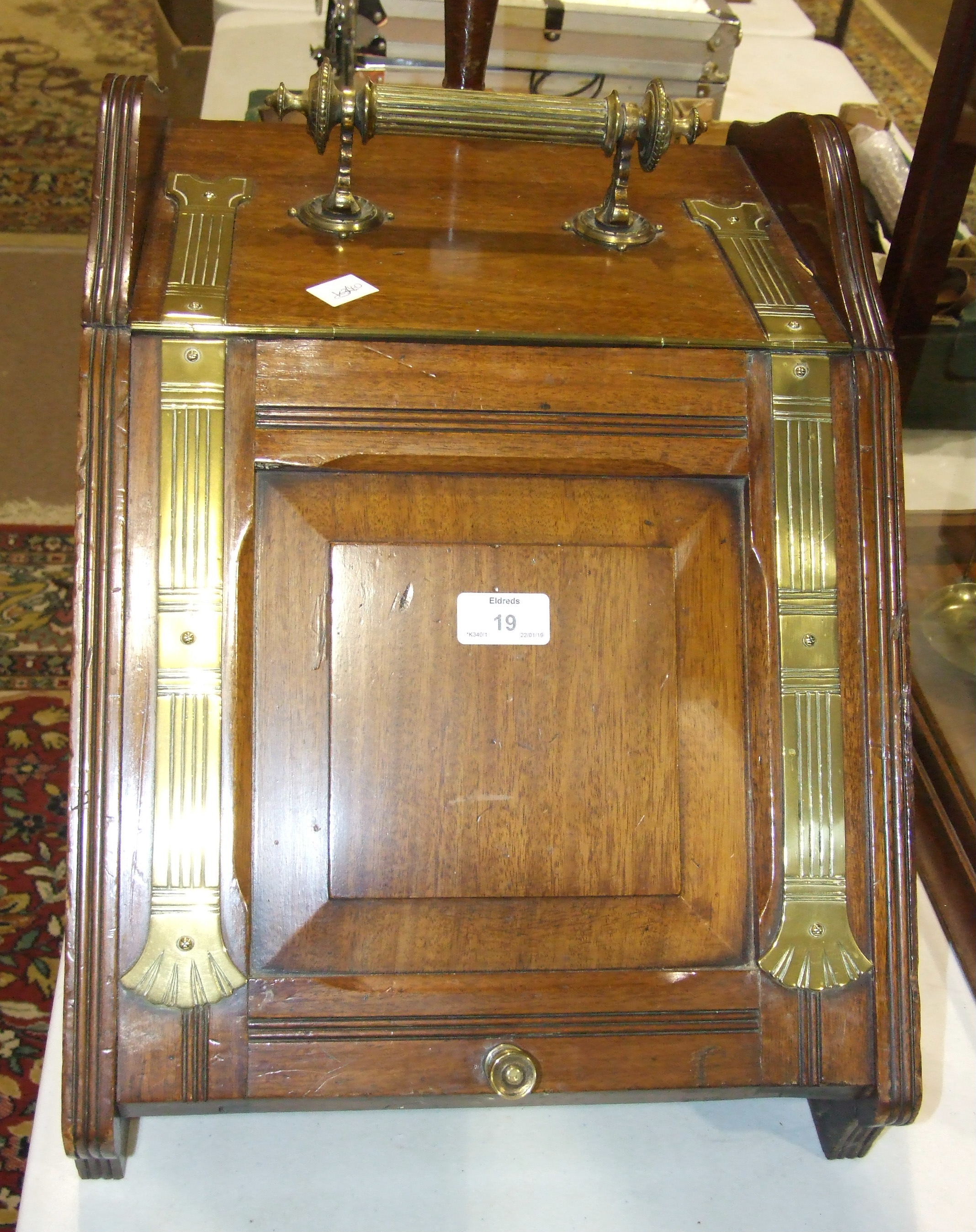 A late-Victorian mahogany coal box fitted with brass hinges, mounts and handle, 34.5cm wide, 34cm