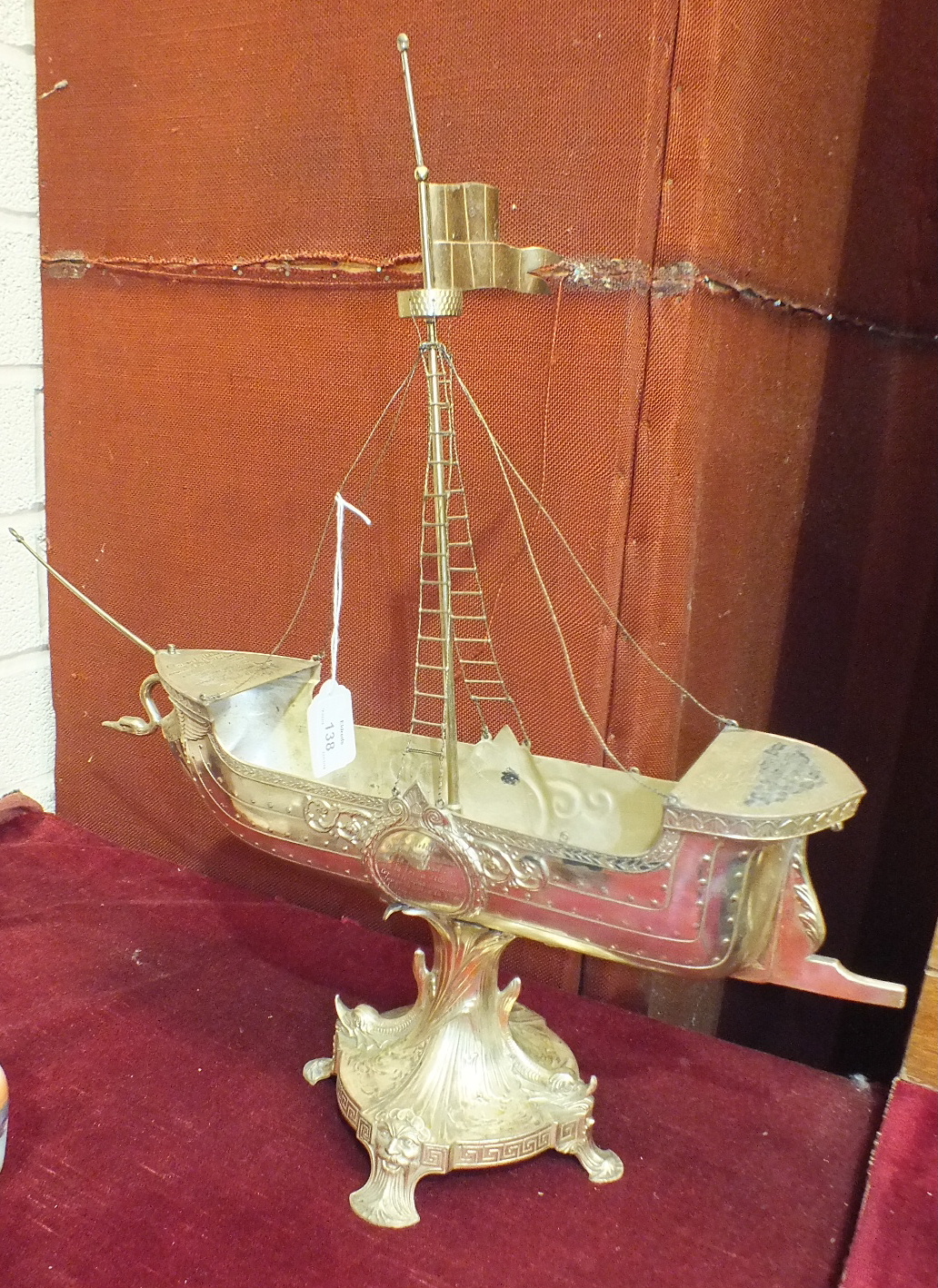 An Italian plated centrepiece in the form of a nef, 54cm high.