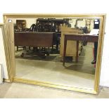 A modern large rectangular gilt-framed hanging wall mirror, 132 x 102cm.