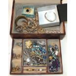 A jewellery box of costume jewellery.