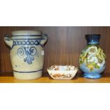 A Doulton Impasto Ware vase of baluster form decorated with dog roses and leaves on a mottled blue