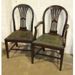 A set of eight 20th century Hepplewhite-style dining chairs, the pierced backs with carved corn