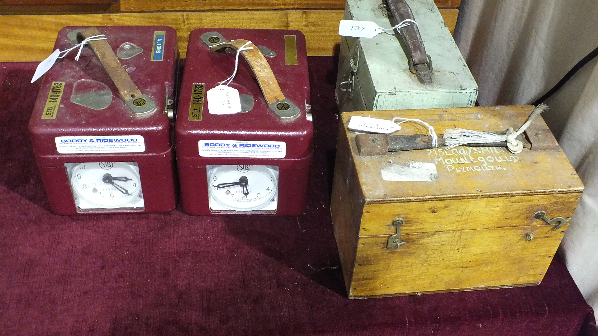 Two Skymaster Ghost Bakelite cased pigeon timer clocks in cases and two STB pigeon timer clocks, (