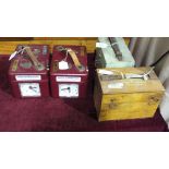 Two Skymaster Ghost Bakelite cased pigeon timer clocks in cases and two STB pigeon timer clocks, (