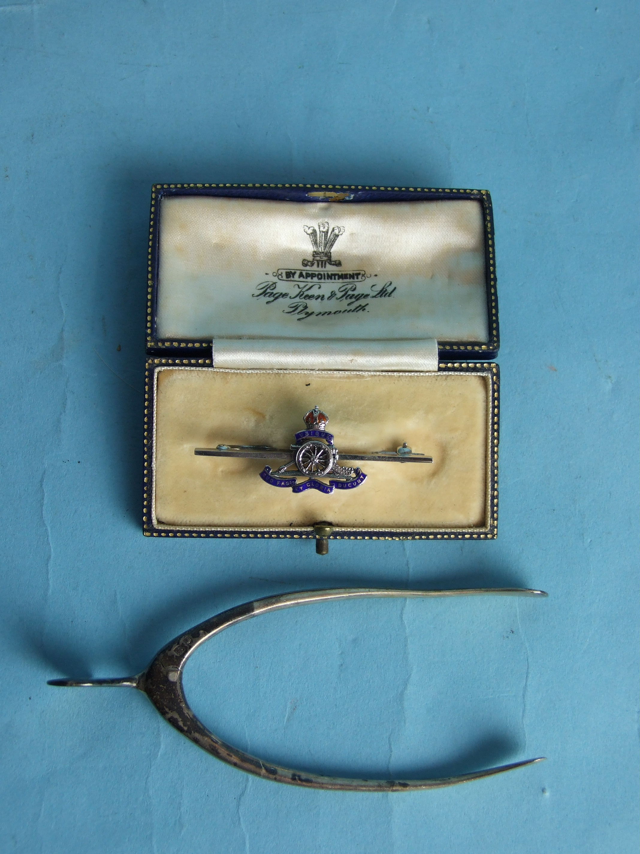 A pair of silver 'wishbone' sugar tongs, London 1929, by S Mordan & Co, together with a silver - Image 2 of 2