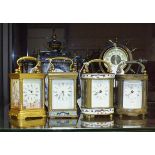 A group of six small reproduction brass and enamelled carriage and mantel clocks, (6).