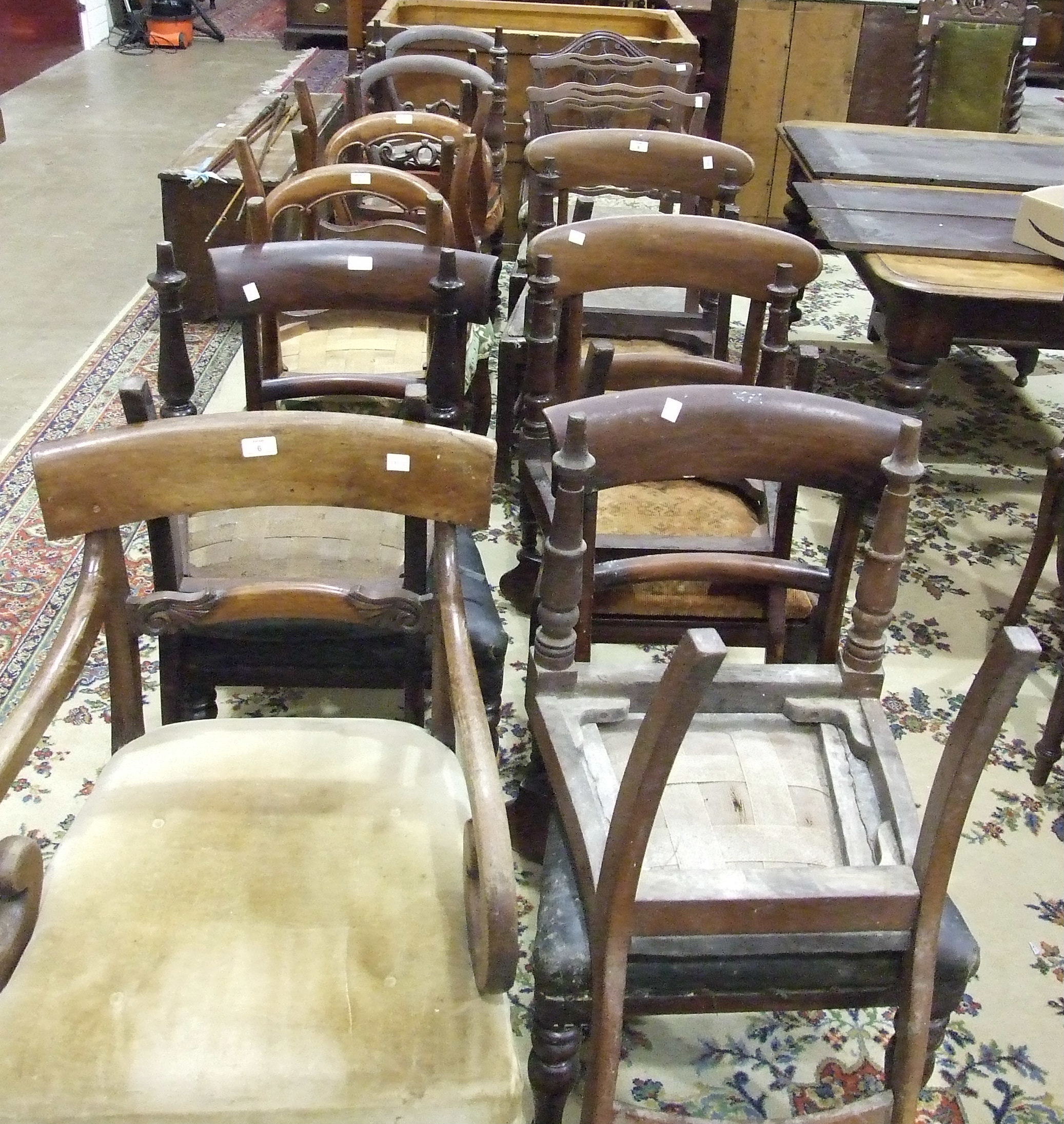 A collection of twenty 19th century mahogany dining chairs, including armchairs, of various