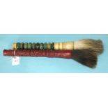 A hardstone-handled large brush and a similar brush with faux-lacquer monkey decoration, (2).