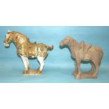 Three Tang-style earthenware horses, one with gilded decoration, (3).
