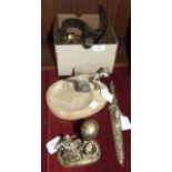 A brass novelty smoker's companion in the form of a pickelhaube, a mortar and a monkey in uniform,