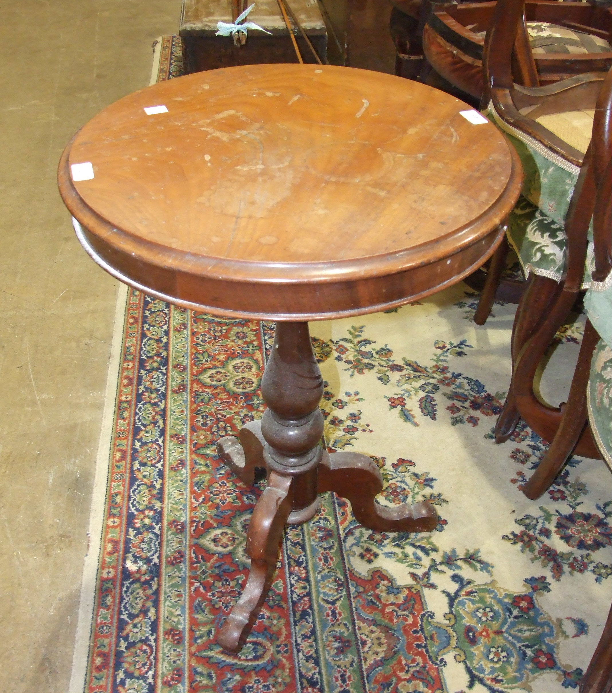 A Victorian mahogany circular occasional table, on baluster-shaped stem and tripod base, 54cm