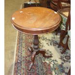 A Victorian mahogany circular occasional table, on baluster-shaped stem and tripod base, 54cm