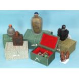 Four Chinese snuff bottles, all boxed, two with internal decoration, one faux horn and one faux