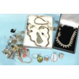 A silver necklace, bracelet and earrings set marcasite and garnets, a silver fringe necklace and