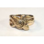 A 9ct gold snake ring with red stone-set eyes, size R, 4.7g.