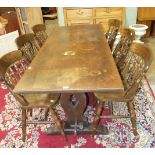 A modern oak refectory-style dining table, 183.5 x 74.5cm and six spindle-back dining chairs.