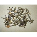 A collection of approximately sixty-five various vintage pocket watch keys.